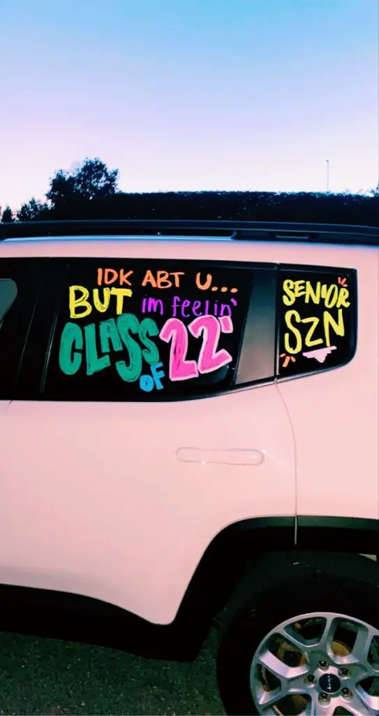 car with the words idk abt u but i'm feelin class of 22 written on the window